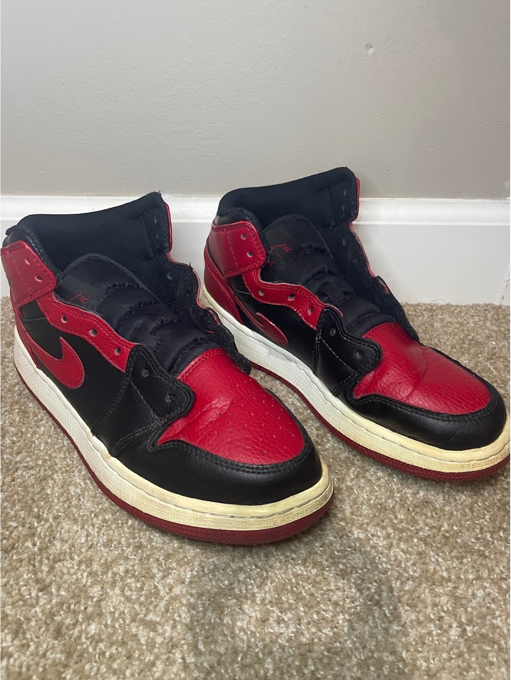 Nike Air Jordan 1 Retro High OG Bred Black and Red Sneakers